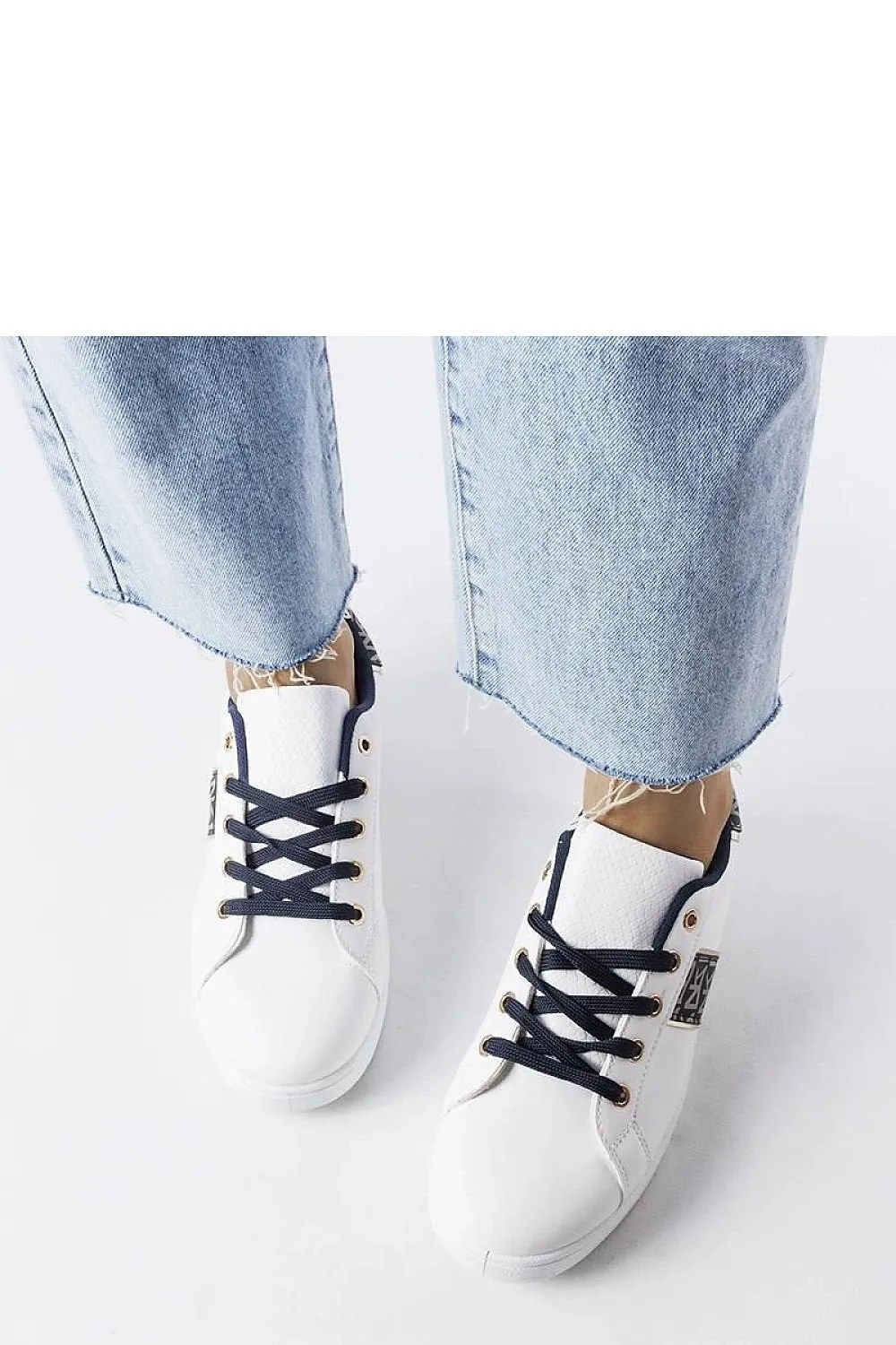 White low upper sneakers