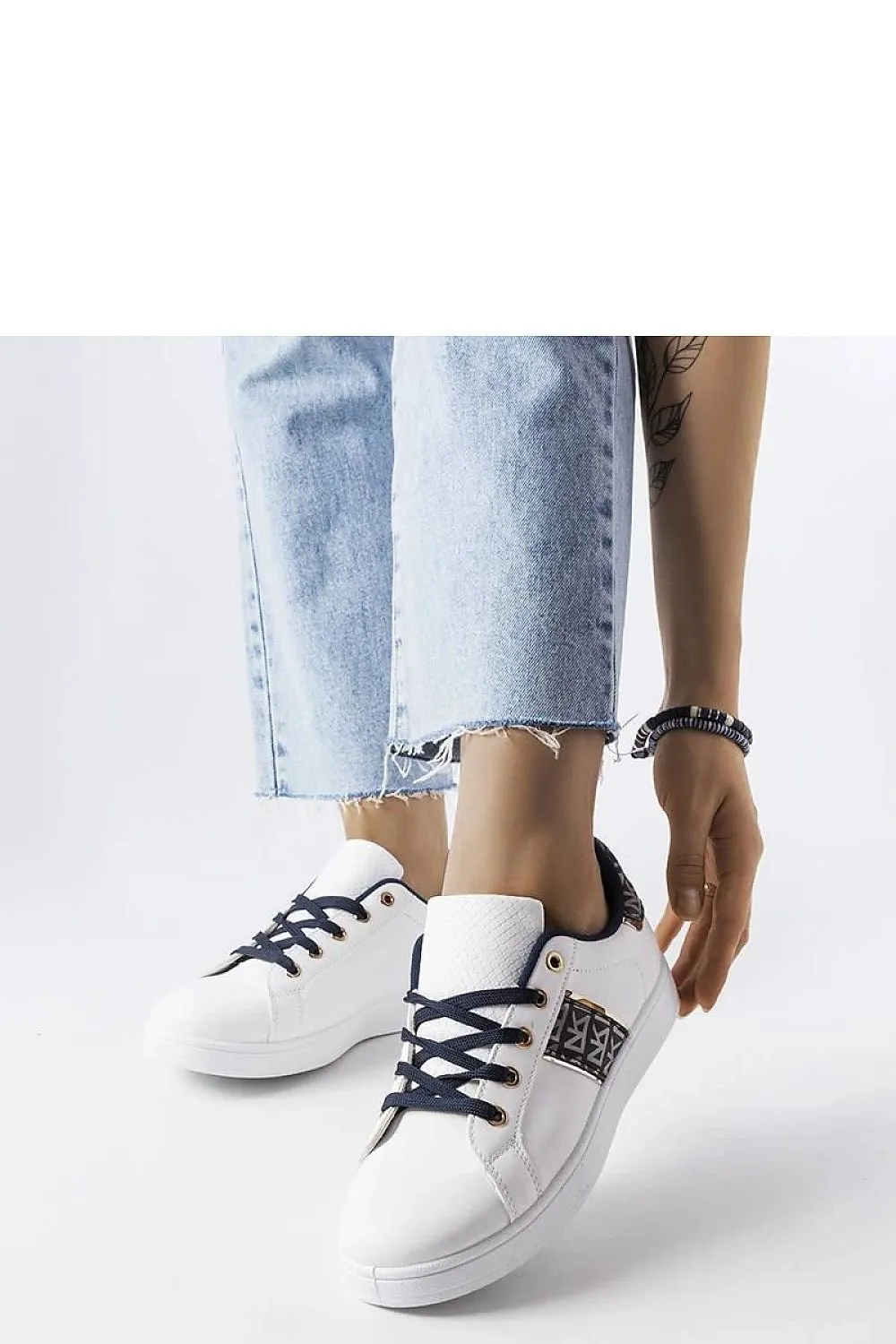 White low upper sneakers